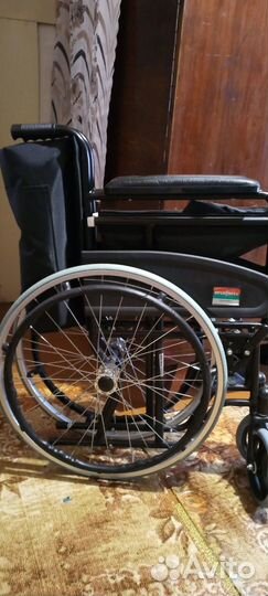 Инвалидная коляска