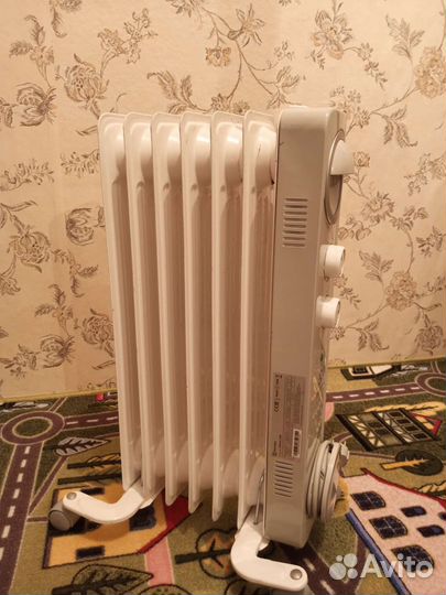 Масляный обогреватель