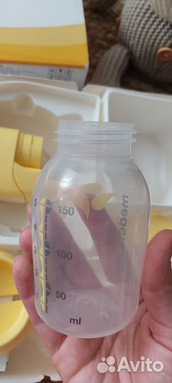 Молокоотсос medela электрический