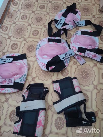 Роликовые коньки