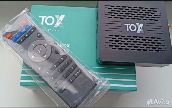 Тв бокс Tox3 + тысячи фильмов, каналов бесплатно