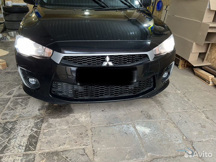 Бампер второй рестайл 2016 Mitsubishi Lancer 10