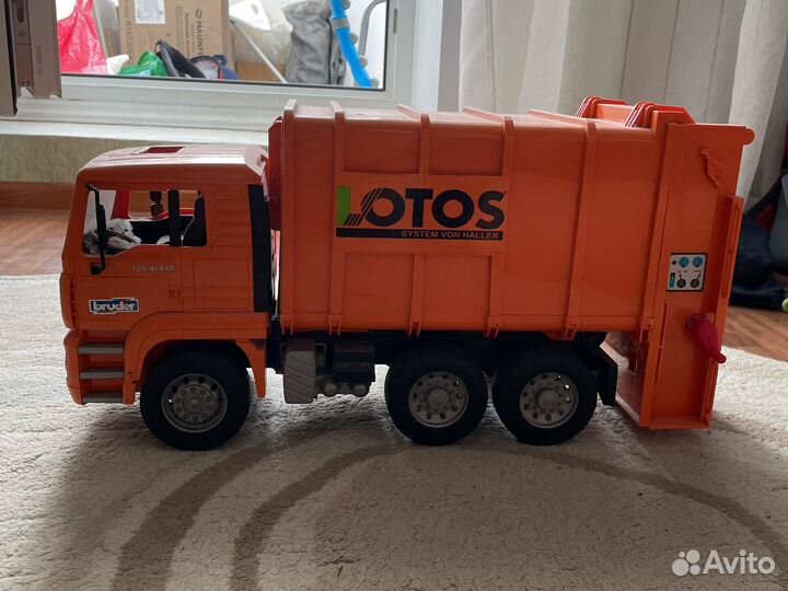Детская игрушка Bruder мусоровоз