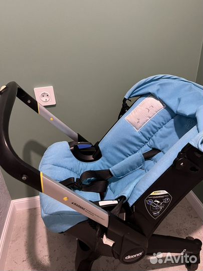 Коляска автокресло doona с базой isofix