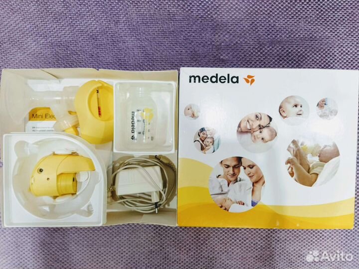 Молокоотсос medela электрический