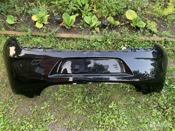 Бампер задний чёрный Opel Astra
