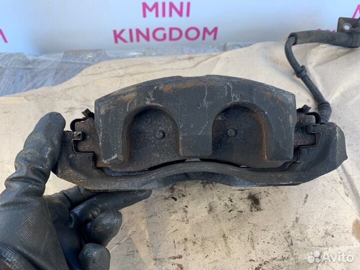 Суппорт тормозной передний левый Ford Explorer