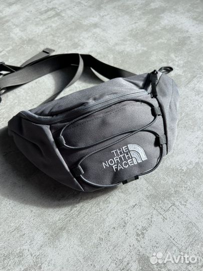 Поясная сумка The north face
