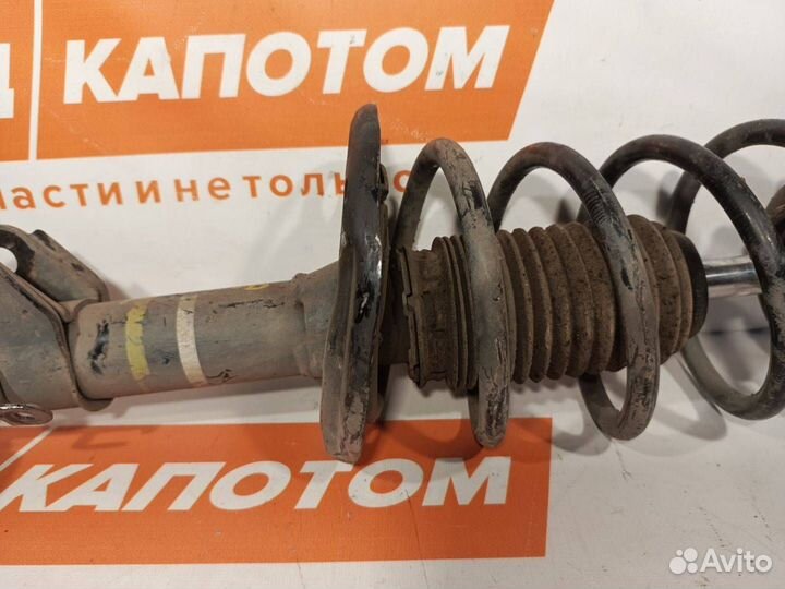 Стойка амортизатора передняя левая Mazda 6