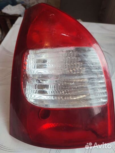 Фонарь задний левый kalina универсал