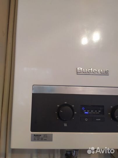 Газовый котел двухконтурный Buderus 044