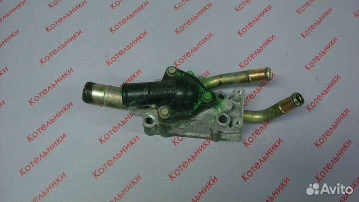 Nissan 11061-4M500 Корпус термостата