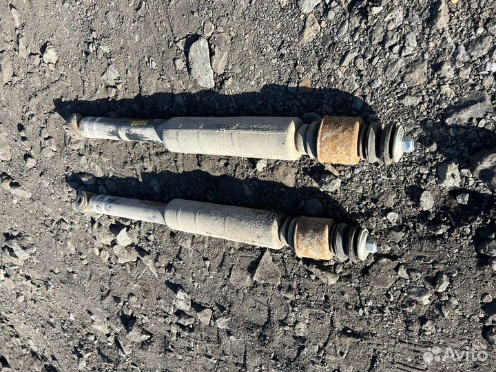 Амортизатор задний Nissan Tiida европа