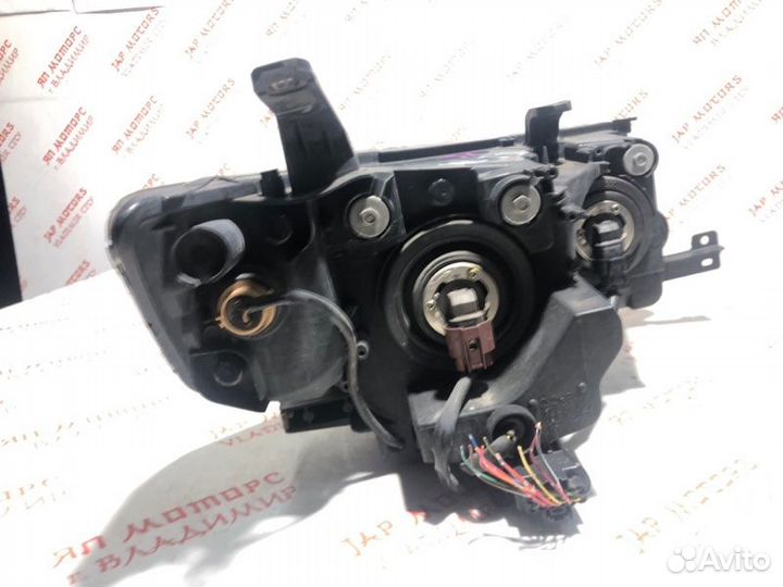 Фара галогеновая левая Mitsubishi Outlander XL