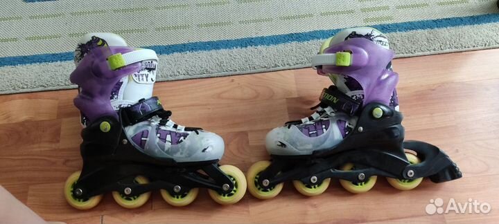 Роликовые коньки