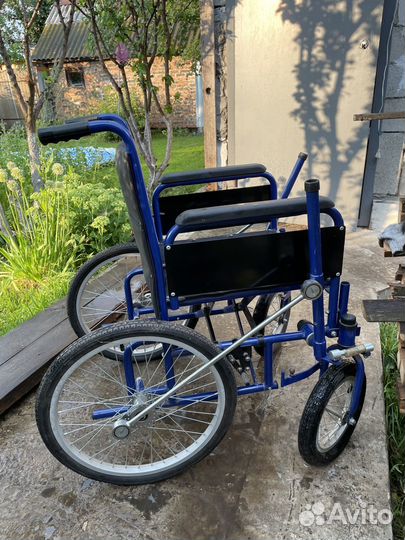 Инвалидная складная коляска с рычажным управлением