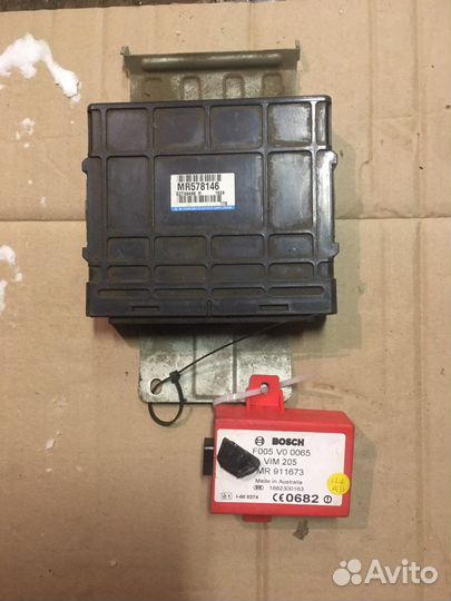 Блок управления двигателем Митсубиси Каризма