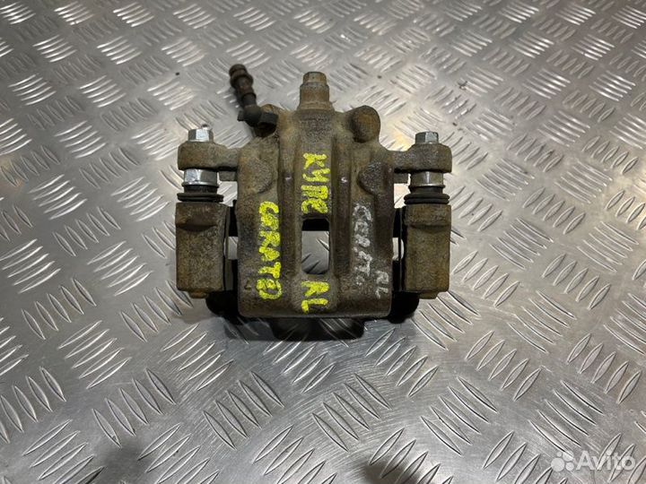 Суппорт тормозной задний левый Kia Cerato купе 2.0