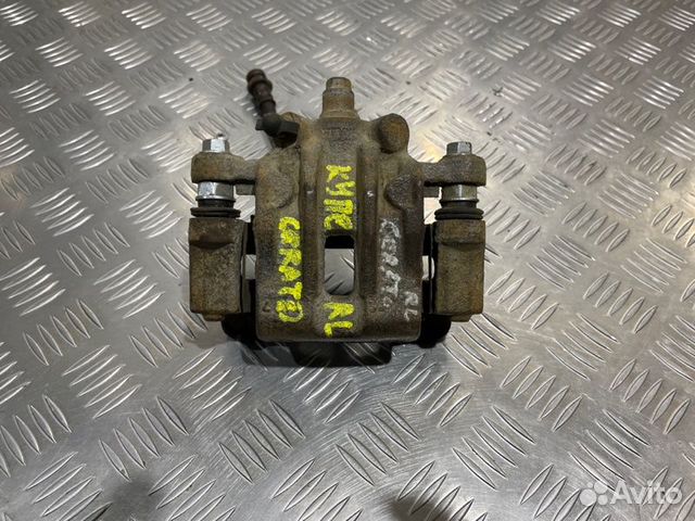 Суппорт тормозной задний левый Kia Cerato купе 2.0