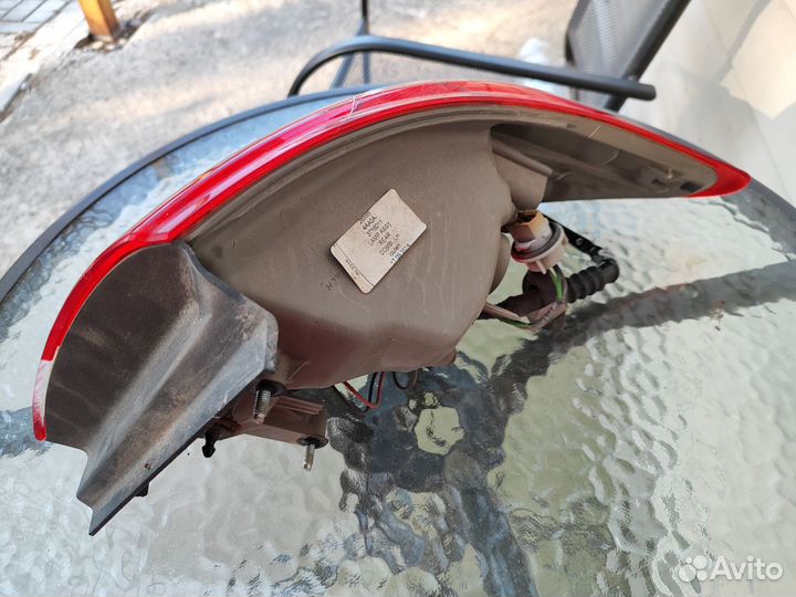 Фонарь задний левый Nissan Almera G15