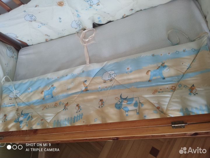 Детская кроватка с матрасом и бортиками