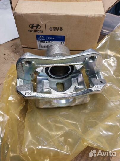 Суппорт передний левый Hyundai I30/Elantra новый