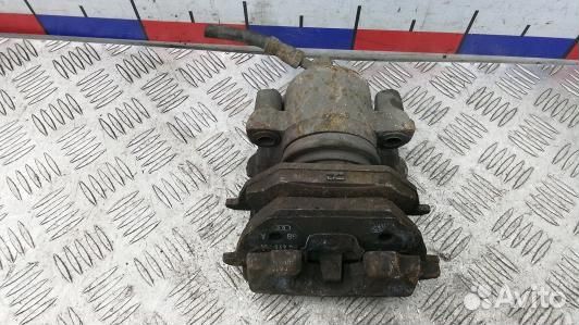 Суппорт тормозной передний левый skoda octavia A5