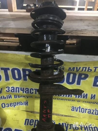 Стойка амортизатора переднего правого Chevrolet La