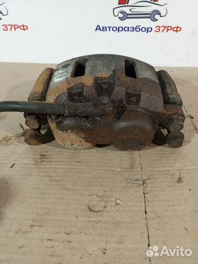 Суппорт тормозной передний Chevrolet Blazer