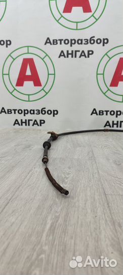 Трос стояночного тормоза задний левый Mitsubishi