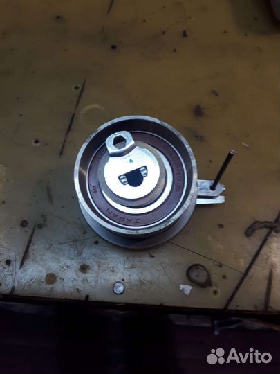 Натяжной ролик