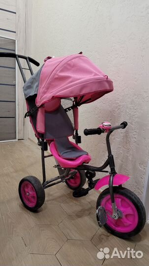 Трехколесный велосипед с ручкой