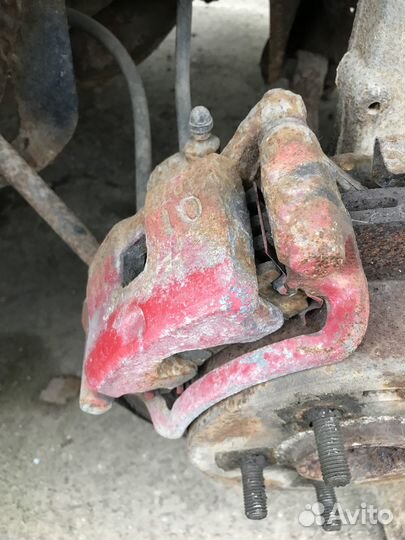 Суппорт задний левый Mitsubishi Galant 8 2.4i