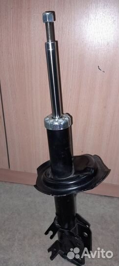 Амортизатор передний левый Suzuki SX4(2006-2012г.в