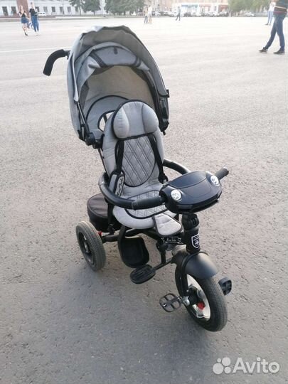 Трехколесный велосипед с ручкой