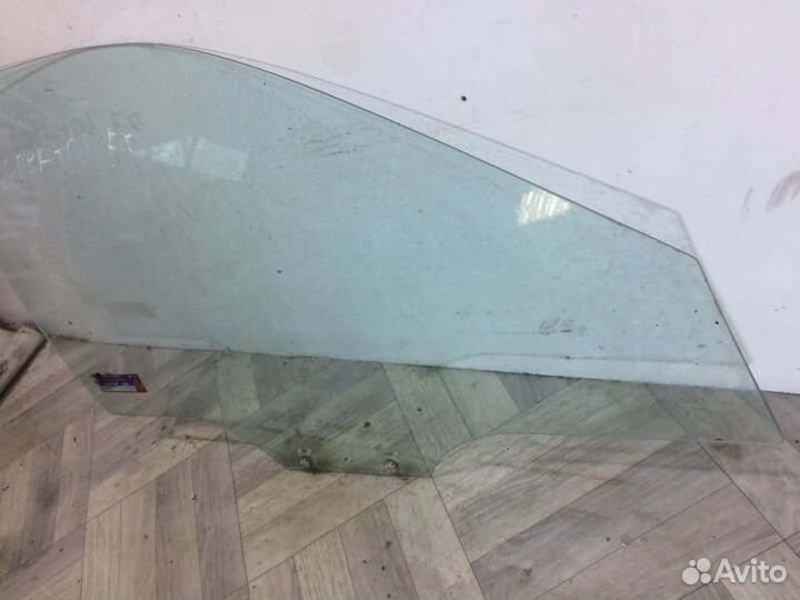 Стекло двери переднее правое Kia Spectra