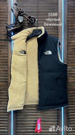 Меховая жилетка новая