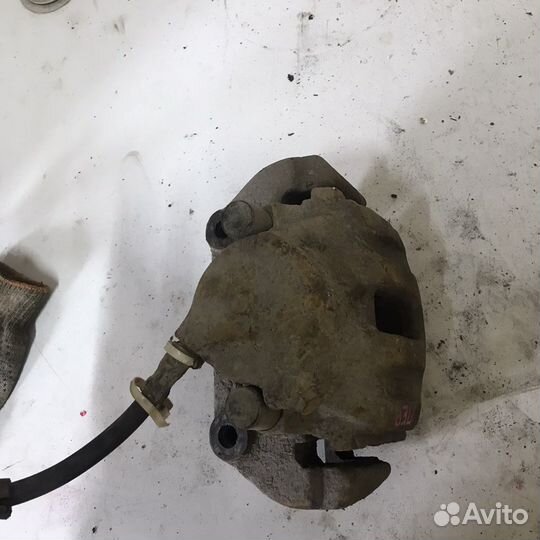 Суппорт передний BMW e32