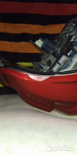 Фонарь левый задний LC200