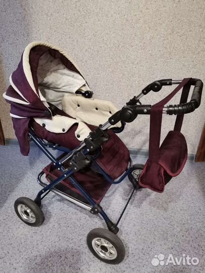 Игрушечная коляска для кукол