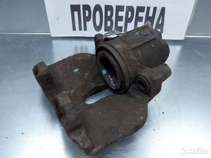 Суппорт тормозной передний левый Volkswagen Sharan