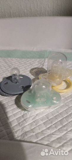 Бутылочки и пустышки