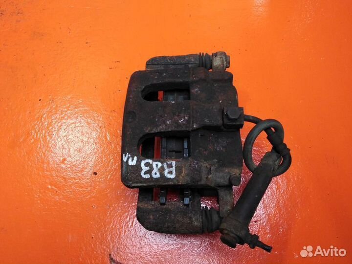 Суппорт тормозной передний левый Ford Explorer