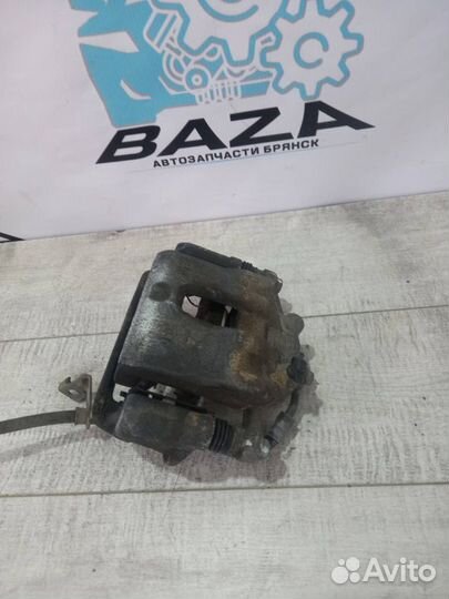 Суппорт передний левый Kia Rio 4