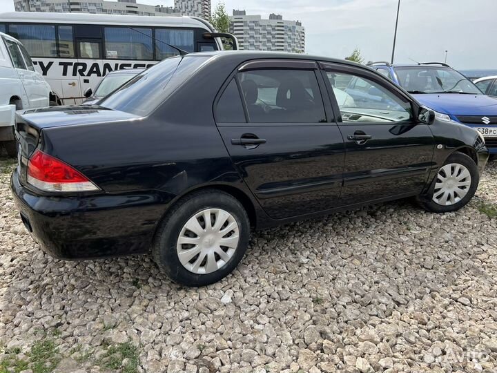 Mitsubishi Lancer 1.6 МТ, 2009, 149 000 км