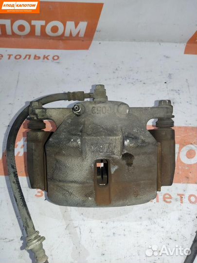 Суппорт тормозной передний правый Nissan X-Trail