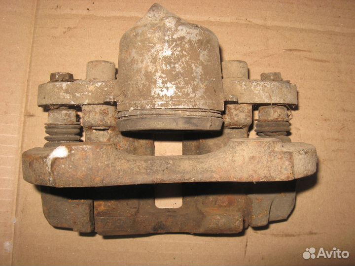 Суппорт тормозной передний левый Ваз 2115, 2109