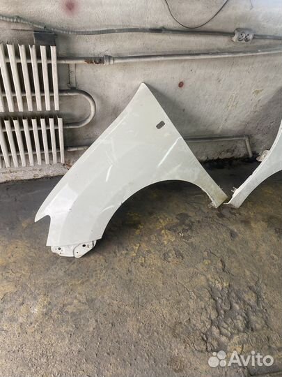 Крылья передние реле логан