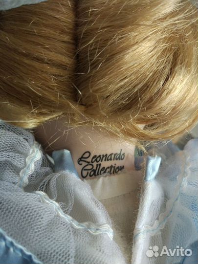 Кукла фарфоровая