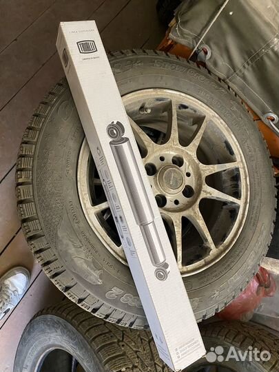 Задний амортизатор Nissan Note